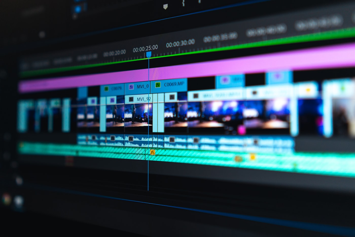 Video editing timeline with color-coded clips
